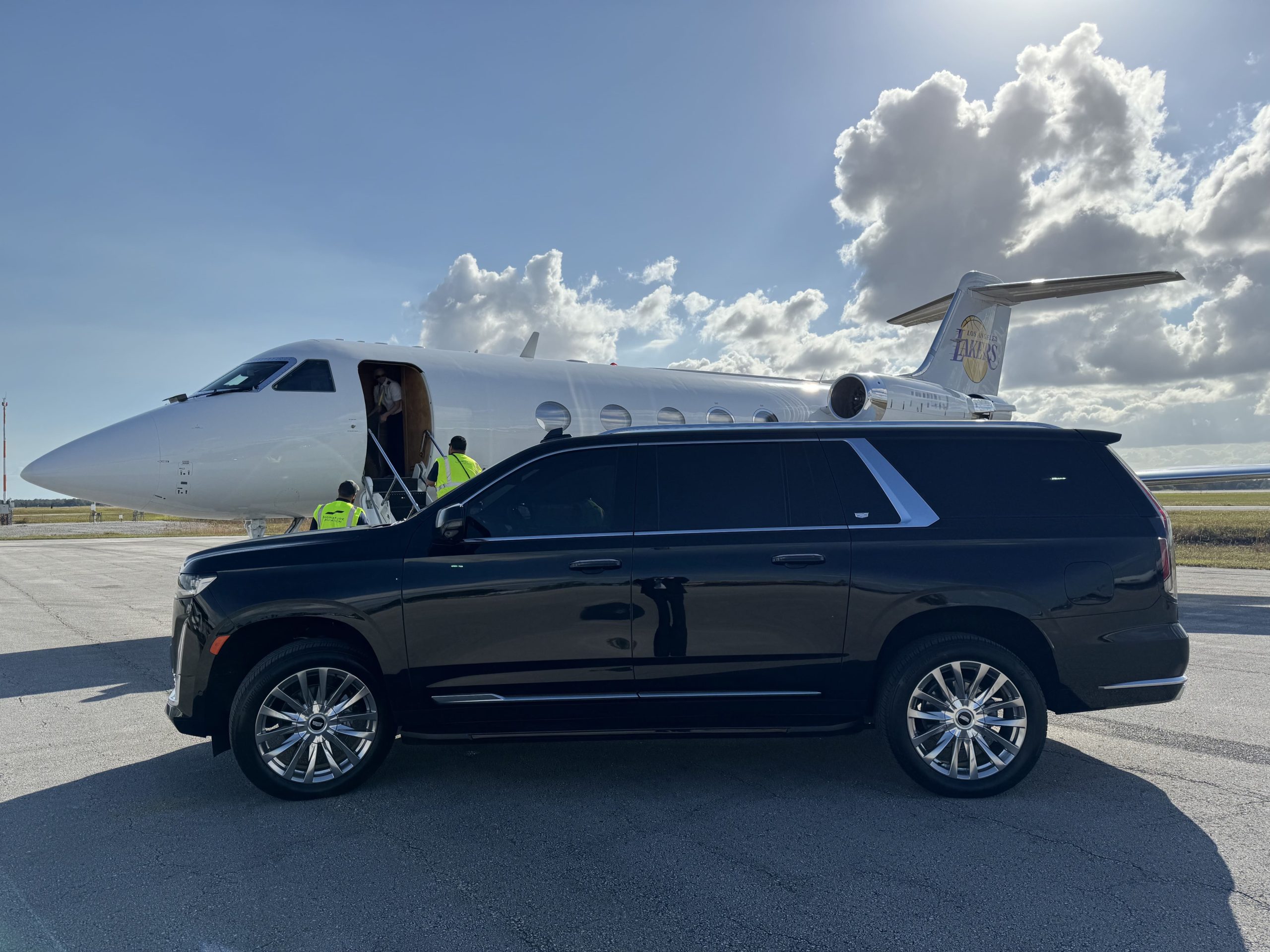 VIP SUV — Cadillac Escalade ESV — Black Chariot Limousine Orlando